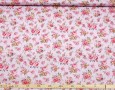 Poplin katoen met een bloemprint.  Roze/rode rozen. Op een lichte, zachtroze ondergrond.  100% katoen  1.60 mtr. breed!  1.10 gr